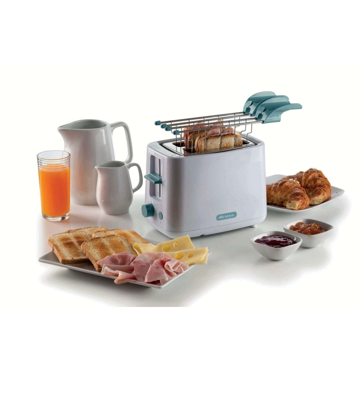 Tostapane Breakfast White & Aegean Teal
0157/04
760 W. Scegli il livello di doratura. Pulizia facile e veloce con vassoio raccogli briciole. Pinze in acciaio inox. Per 2 fette. Pratico e ideale per ogni angolo della cucina. Bianco& Celeste