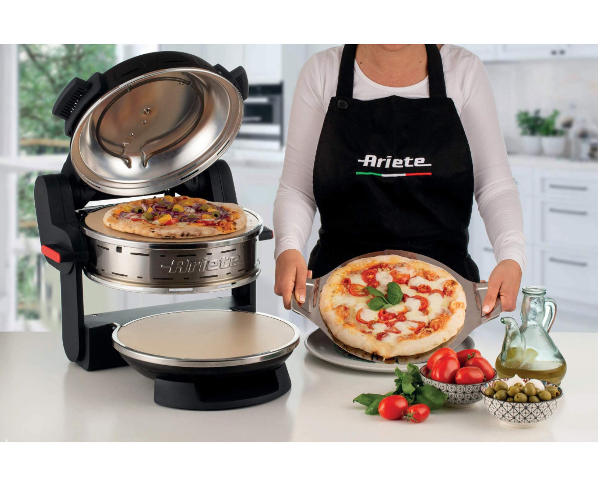 Pizzeria Ariete Nero
0927/01
Forno elettrico per 2 pizze con 2 pietre refrattarie di 32 cm di diametro con trattamento antiaderente. 2 termostati separati. 5 livelli di cottura. Temperatura massima 400°. Ideale per cuocere 2 pizze contemporaneamente. Nero
