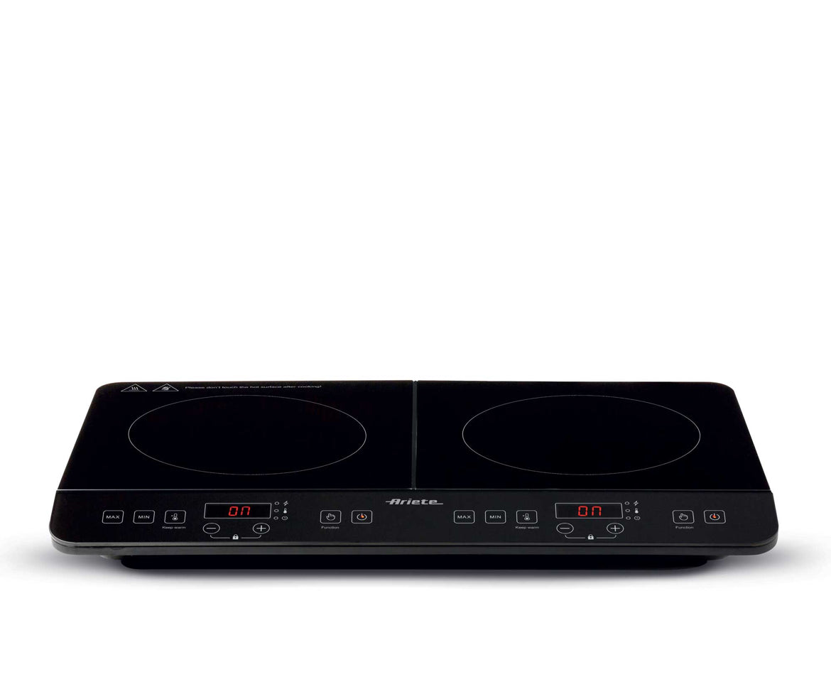 Piastra a induzione doppia
1998/00
Per campeggi, ufficio o cucina. 2000W + 1500W, 12 livelli potenza e 10 livelli temperatura. 2 piastre in vetroceramica. Sicurezza per bambini.