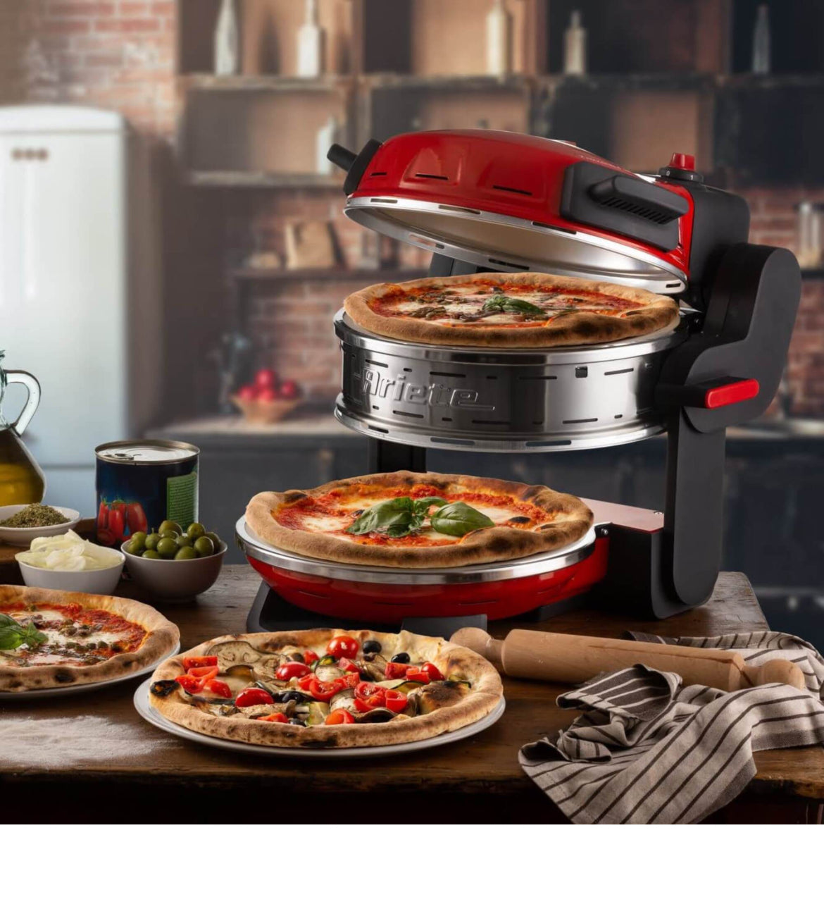 Pizzeria Ariete Rosso
0927/00
Forno elettrico per 2 pizze con 2 pietre refrattarie di 32 cm di diametro con trattamento antiaderente. 2 termostati separati. 5 livelli di cottura. Temperatura massima 400°. Ideale per cuocere 2 pizze contemporaneamente. Pro