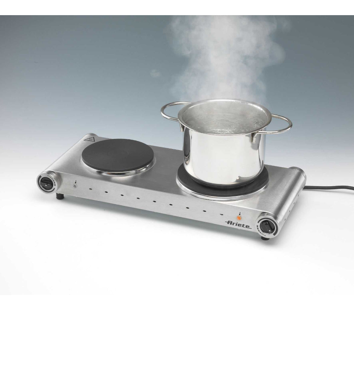 Piastra di cottura doppia
0994/20
Fornello elettrico a doppia piastra ideale per cucinare fuori casa in viaggio o campeggio