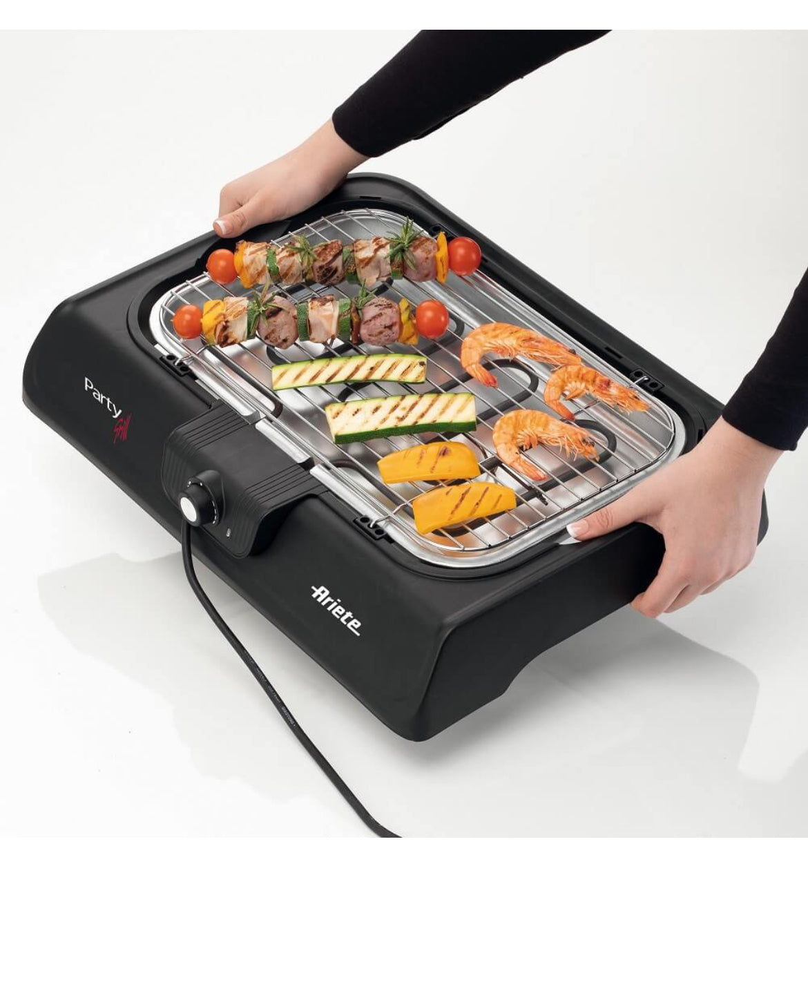 Party Grill 723
0723/00
Griglia elettrica con doppia griglia a libro per cucinare carne, pesce e verdure in maniera rapida. Potenza 2000W. 2 modalità di cottura: rapida e lenta